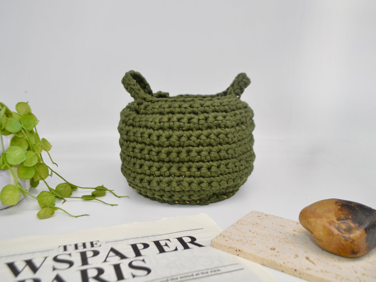 Finished olive green crochet basket, one of the projects in the Christmas Crochet Box