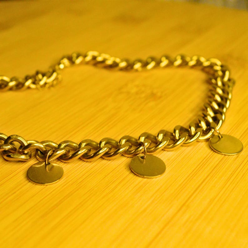 Gold chunky chain necklace with three round charms