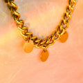 Gold chunky chain necklace with three round charms