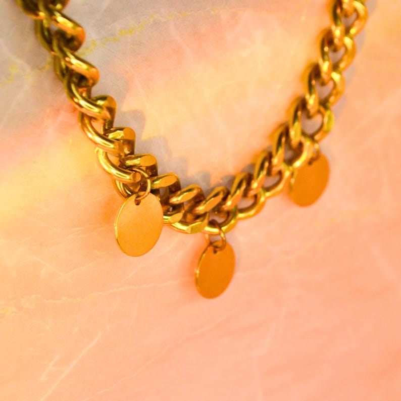 Gold chunky chain necklace with three round charms