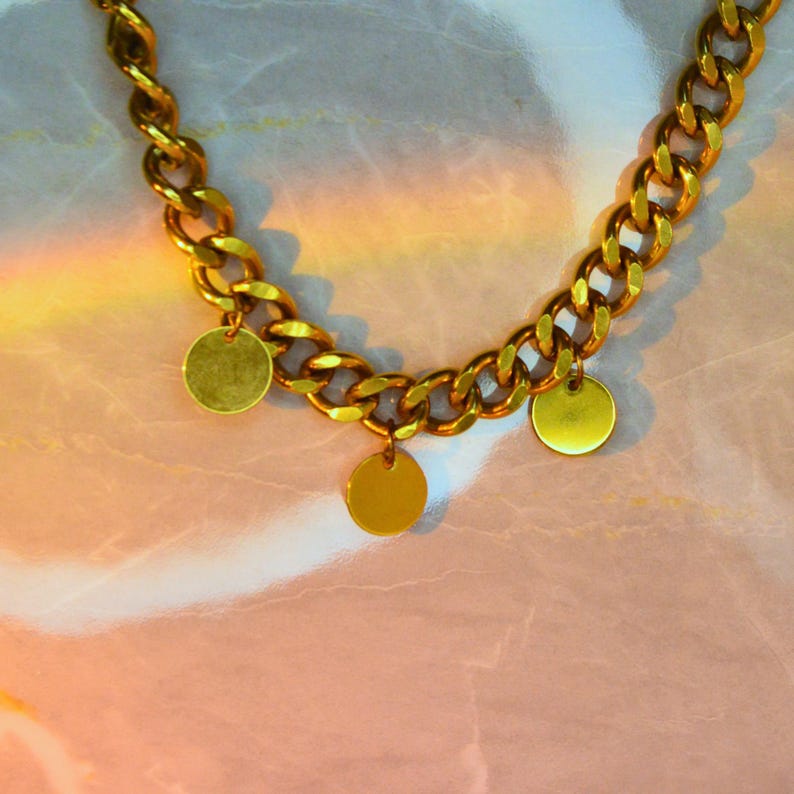Gold chunky chain necklace with three round charms