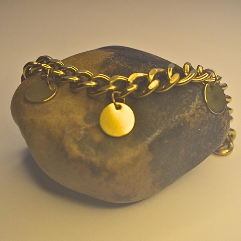 Gold chain bracelet with round charms