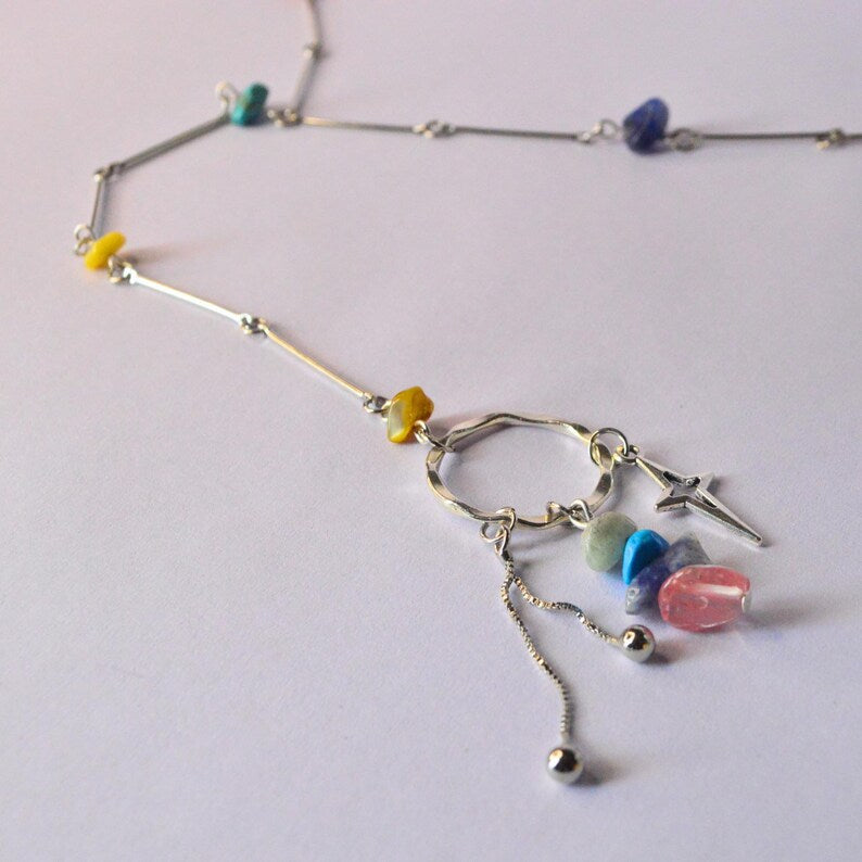 Multicoloured stone beaded necklace with three dangling charms