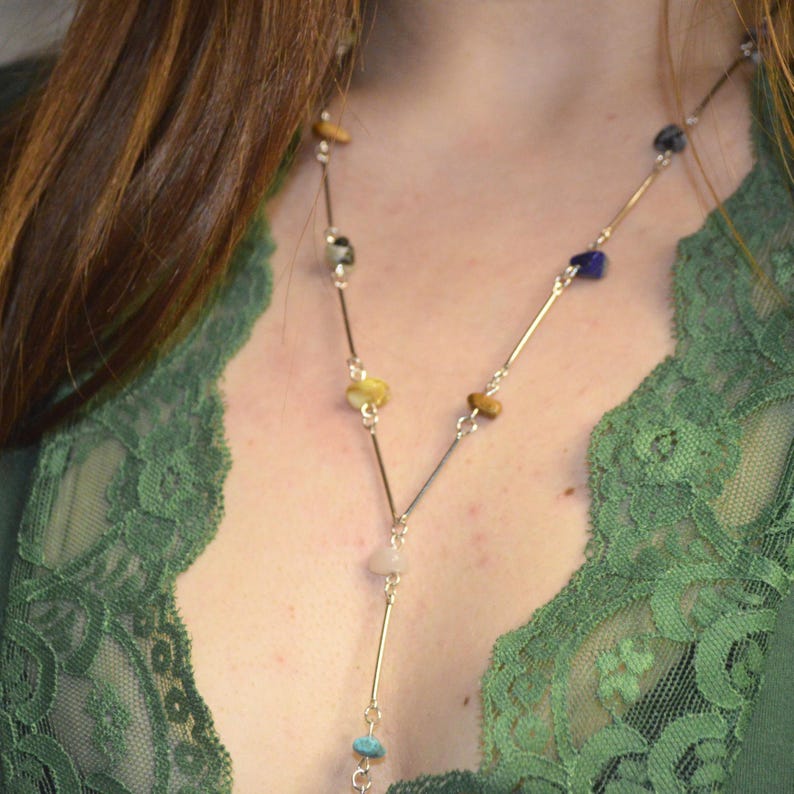 Multicoloured stone beaded necklace with three dangling charms