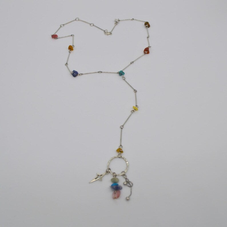 Multicoloured stone beaded necklace with three dangling charms