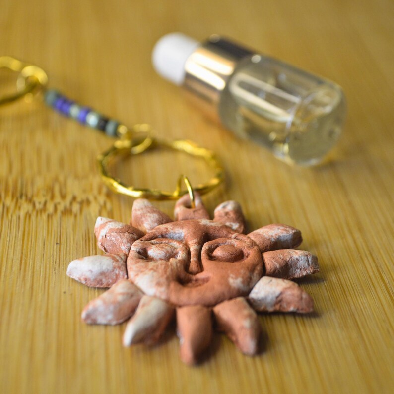 Sun pendant used as a keychain