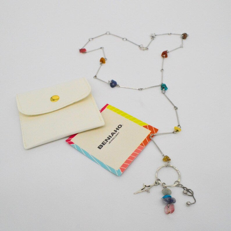 Multicoloured stone beaded necklace with three dangling charms